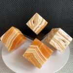 Banded Orange Calcite Magic Cube Carving