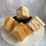 Banded Orange Calcite Magic Cube Carving